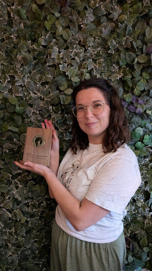 Tish Graham holding her Game Quality 2026 award